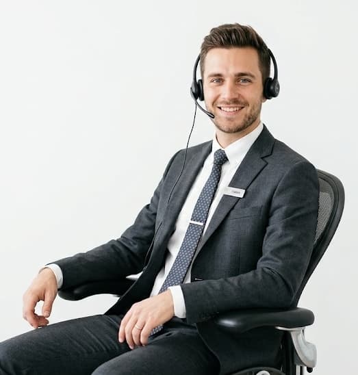 Fabien, an AI sales agent, wearing a headset and ready to call